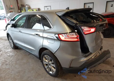 2022 Ford Edge Titanium z USA, uszkodzony, nr VIN 2FMPK4K90NBA93793